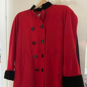 RED WOOL/CASHMERE COAT, LINED W/BLACK VELVET CUFFS/ COLLAR AND BLACK BUTTONS.